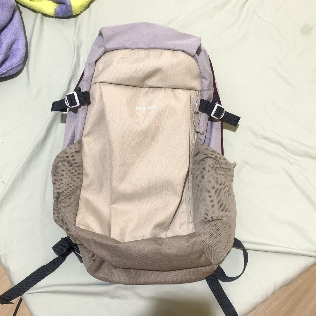 Quechua 20L Backpack (Category: Backpacks) located in Rizal. Submitted by alexieesclanda (Listing ID 1454156356, Image 1). Description: - Quechua 20L Backpack - Color: Beige and Grey - Features: Mesh side pockets, padded straps - Main compartment with zipper closure - Ideal for day trips and hiking - Lightweight: 470.2g.