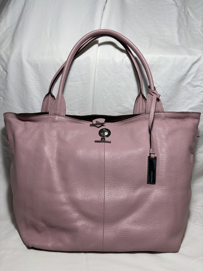 RABEANCO LEATHER TOTE (Category: Luxury Bags & Wallets) located in Taguig. Submitted by vittelina (Listing ID 1454088753, Image 1). Description: - very good condition -spacious, clean lining, no noticeable scratches or discoloration on outer leather, multipurpose bag with detachable pouch - with dust bag, bought in HongKong - 10 1/2 W x 11 H x 6 3/4 D .