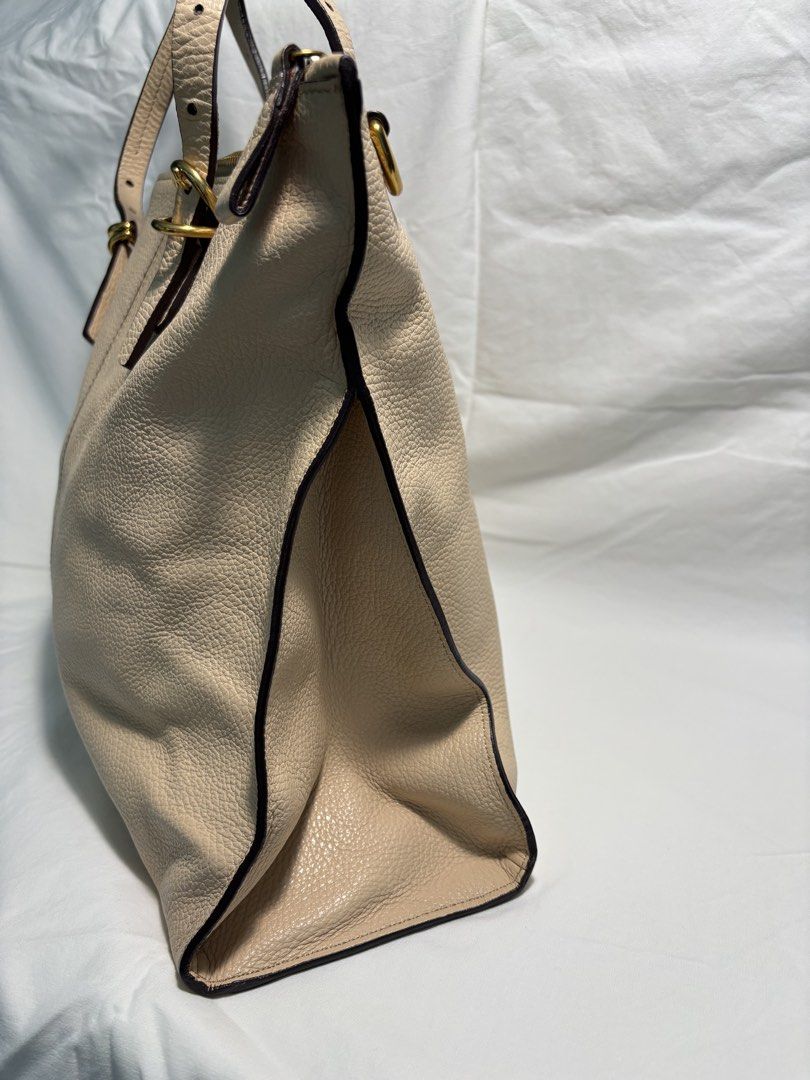 RABEANCO TOTE (Category: Luxury Bags & Wallets) located in Taguig. Submitted by vittelina (Listing ID 1454039984, Image 3). Description: - light Beige / chalk - very good condition, no visible scratches or discoloration on the leather. Clean inside lining - with Dustbag - bought in Hong Kong -15 3/4 W x 12 H x 5 D inches.