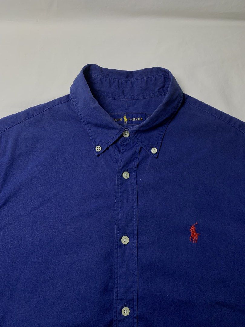 Ralph Lauren Polo Button Down Long sleeve Navy Blue (Category: Luxury Apparel) located in Manila. Submitted by macadr1p (Listing ID 1454157499, Image 3). Description: RALPH LAUREN Dimes: 21x29 Best fit: M/L Color rate: 10/10 Condition: Like new - no issues - Complete tags - Color not faded at all - Collar not faded - No sign of usage - High quality Fabrics - OVERALL💯 ✔ Premium fabric for all-day comfort ✔ Clean and versatile style ✔ Classic and 