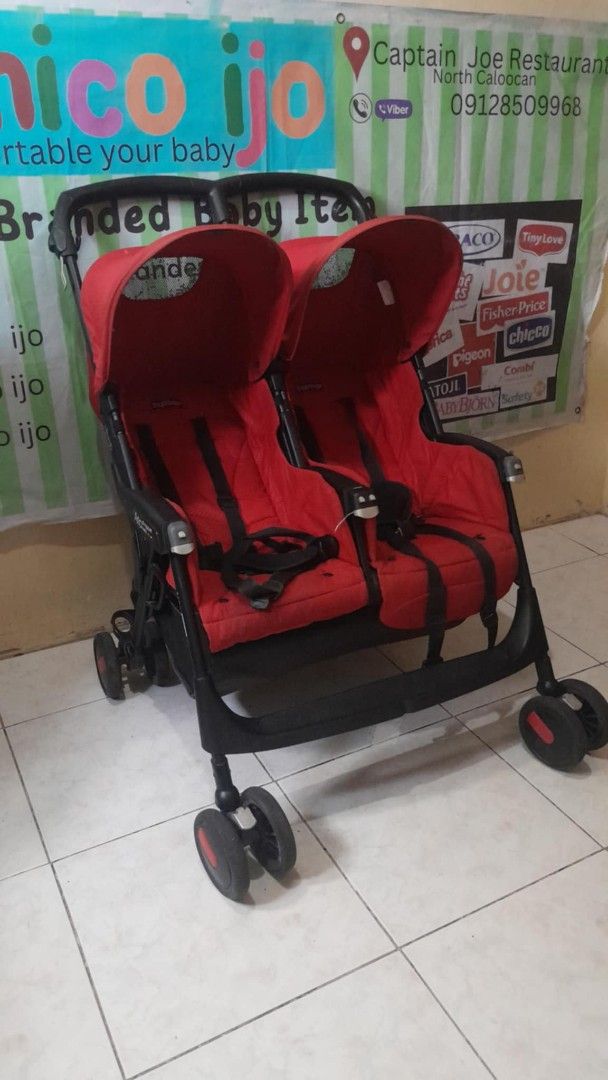 Red Twin Stroller for Two Babies (Category: Strollers) located in Caloocan City. Submitted by Unicoijo02 (Listing ID 1454163858, Image 3). Description: - Red double stroller, ideal for twins or siblings close in age. - Easy to maneuver for smooth rides. - Conveniently folds for compact storage. - Equipped with safety harnesses for secure seating. - Ready for your next adventure!.