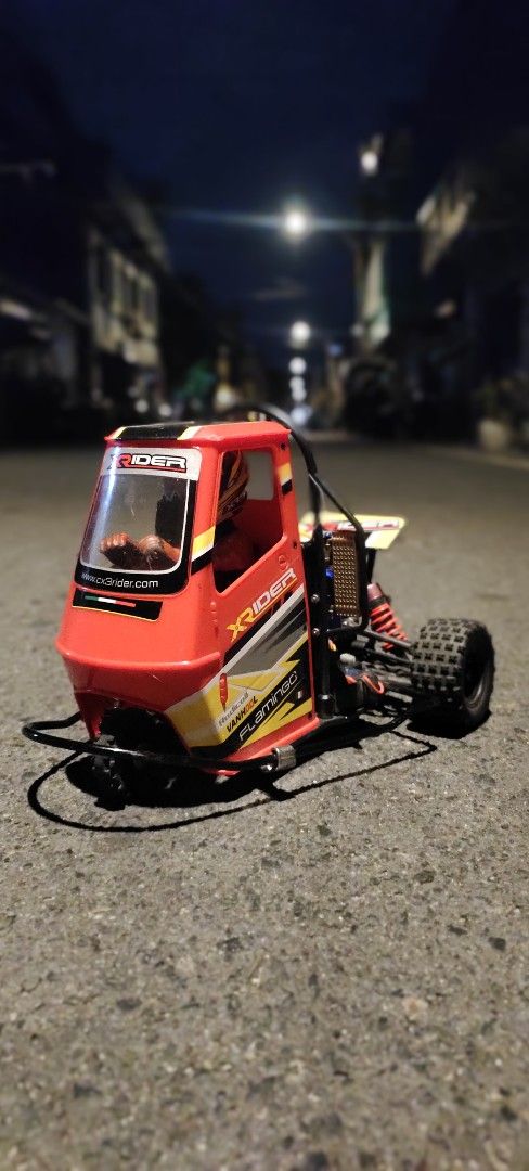 Red Xrider RC Buggy Off-Road Remote Control Car (Category: Remote Control Toys) located in Caloocan City. Submitted by mjraymundo48160 (Listing ID 1454040765, Image 1). Description: - Xrider buggy for sale - Ready to run off-road - Strong frame and suspension - Tires with good grip - Minor scuffs from use - Great for outdoor adventures.