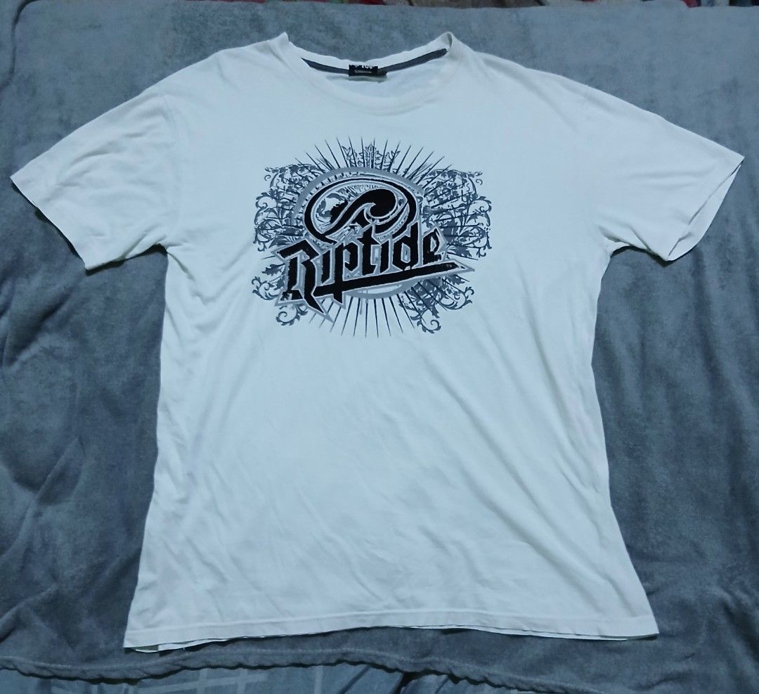 Riptide Graphic T-Shirt White (Category: Tshirts & Polo Shirts ) located in Bulacan. Submitted by esecleus (Listing ID 1454039163, Image 1). Description: - White Riptide graphic t-shirt - Features a cool design on the front - Made from comfortable cotton material - Ideal for everyday casual wear.