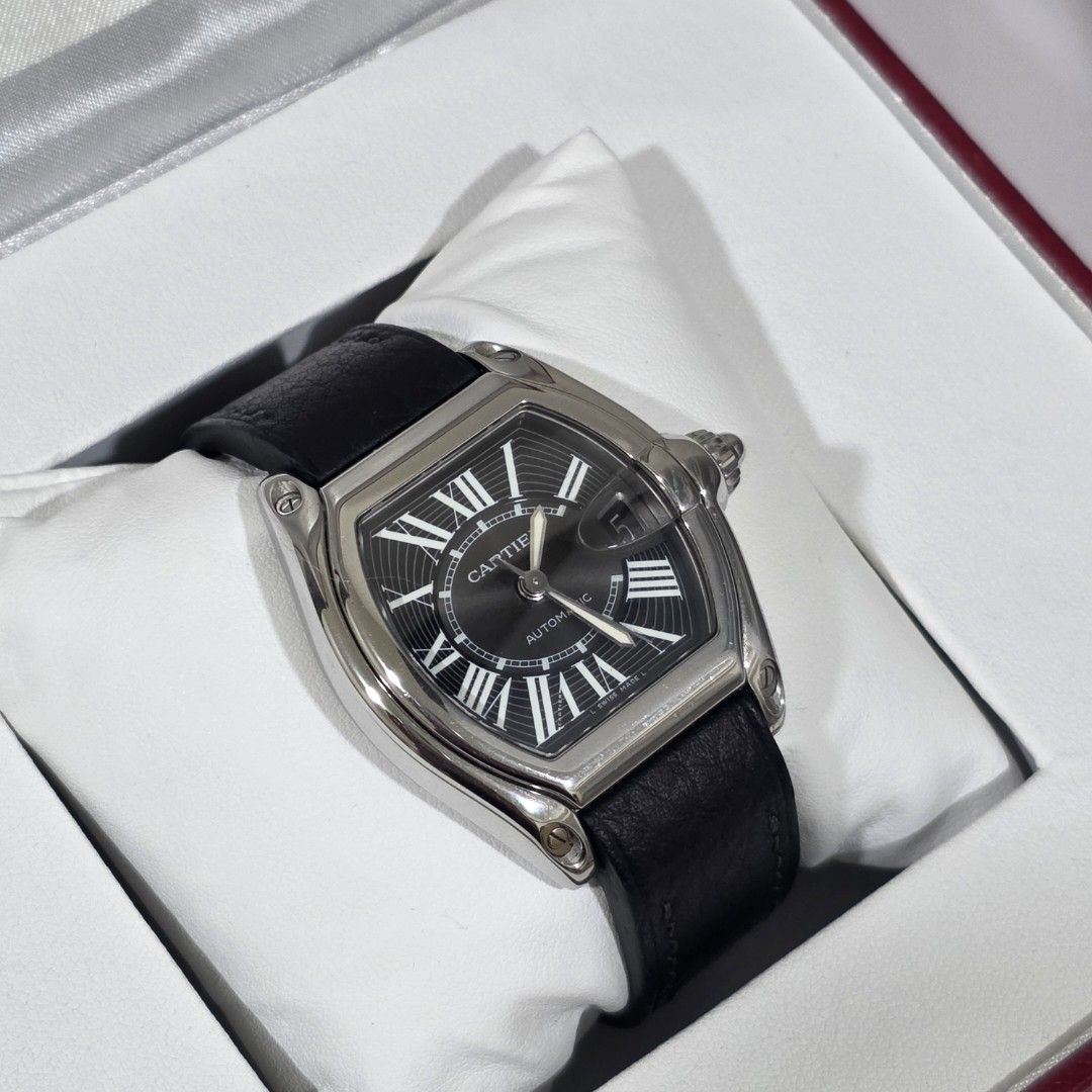 Roadster de Cartier Large Black Dial Leather Strap (Category: Luxury Watches) located in Mandaluyong City. Submitted by patmorita (Listing ID 1454092253, Image 2). Description: For Sale only Roadster De Cartier Ref W62041V3 Watch and box only Authenticated via Cartier website Case size : 44.32mm x 38.68mm Black Dial Roman numerals indices Automatic winding, Caliber Cartier 3110 100m water resistant Strap replaced but mechanism from original strap