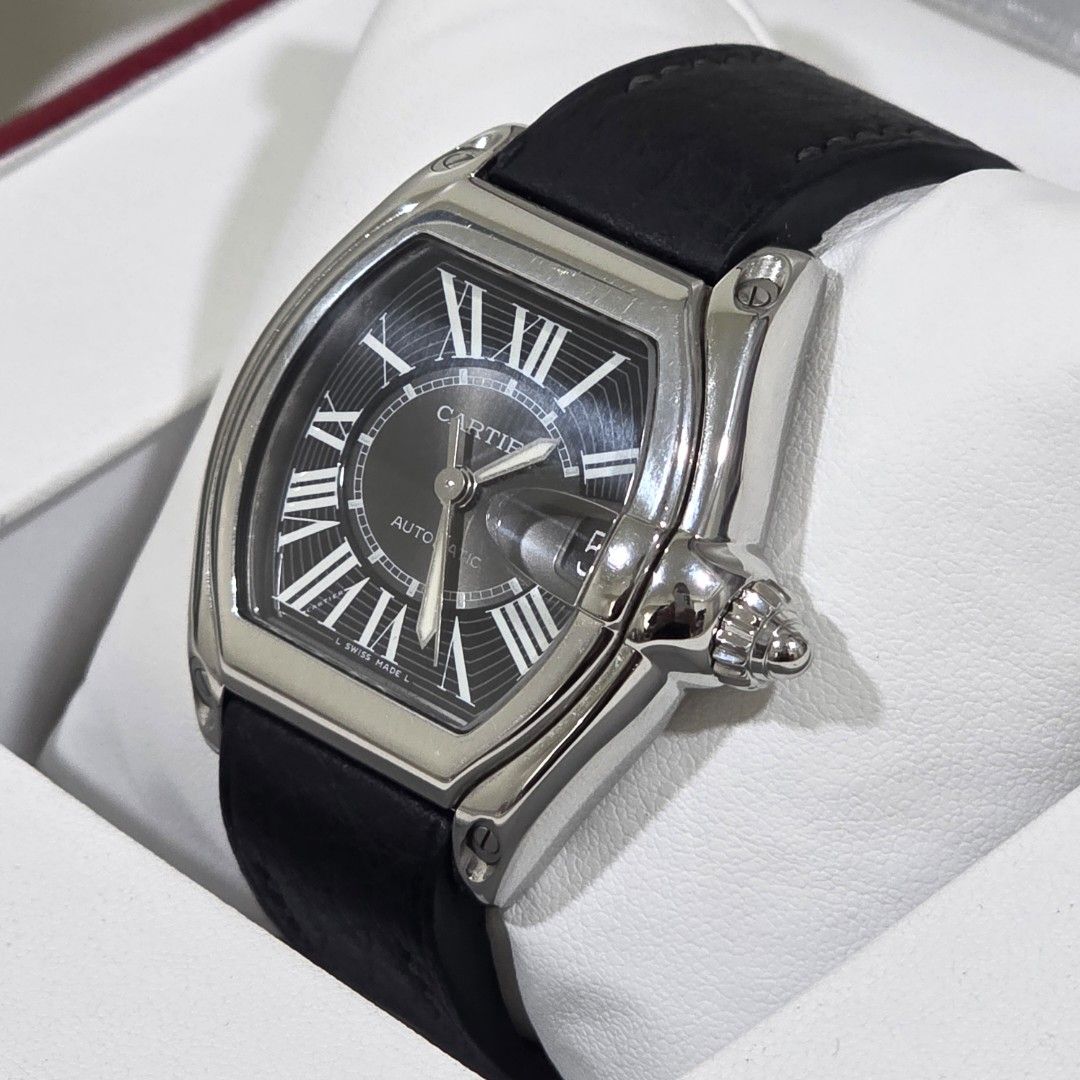 Roadster de Cartier Large Black Dial Leather Strap (Category: Luxury Watches) located in Mandaluyong City. Submitted by patmorita (Listing ID 1454092253, Image 1). Description: For Sale only Roadster De Cartier Ref W62041V3 Watch and box only Authenticated via Cartier website Case size : 44.32mm x 38.68mm Black Dial Roman numerals indices Automatic winding, Caliber Cartier 3110 100m water resistant Strap replaced but mechanism from original strap