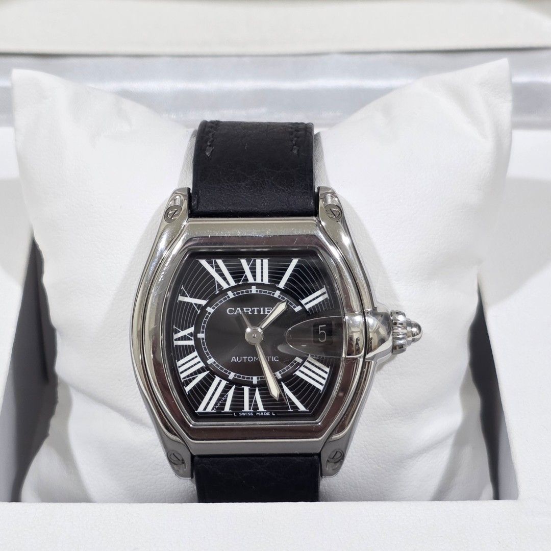 Roadster de Cartier Large Black Dial Leather Strap (Category: Luxury Watches) located in Mandaluyong City. Submitted by patmorita (Listing ID 1454092253, Image 3). Description: For Sale only Roadster De Cartier Ref W62041V3 Watch and box only Authenticated via Cartier website Case size : 44.32mm x 38.68mm Black Dial Roman numerals indices Automatic winding, Caliber Cartier 3110 100m water resistant Strap replaced but mechanism from original strap
