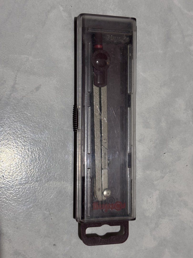 Rotring Compass Set with Case (Category: Stationery & School Supplies) located in Antipolo. Submitted by stephentab38127 (Listing ID 1454125396, Image 1). Description: - Rotring compass in original case - Ideal for drawing circles and arcs - Compass is in good shape, all parts appear to be present - Case shows some scuffs, but is functional - Ready for your next drawing or drafting project.