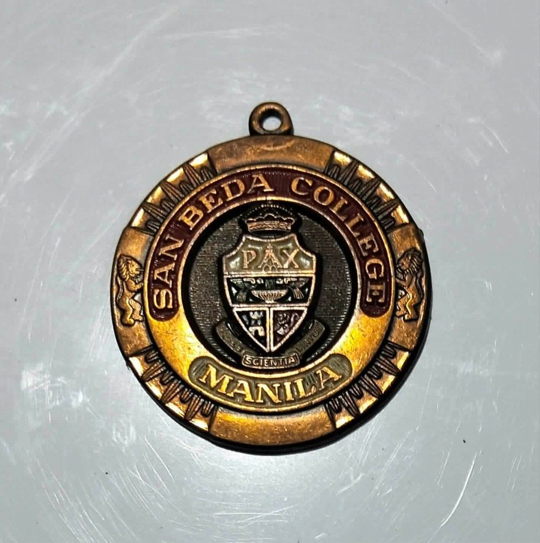 San Beda College Manila Medal (Category: Currency) located in Quezon City. Submitted by collectible.books.ephemera (Listing ID 1454170776, Image 1). Description: SAN BEDA COLLEGE , MANILA School Medal Diameter 1.5 Inches.