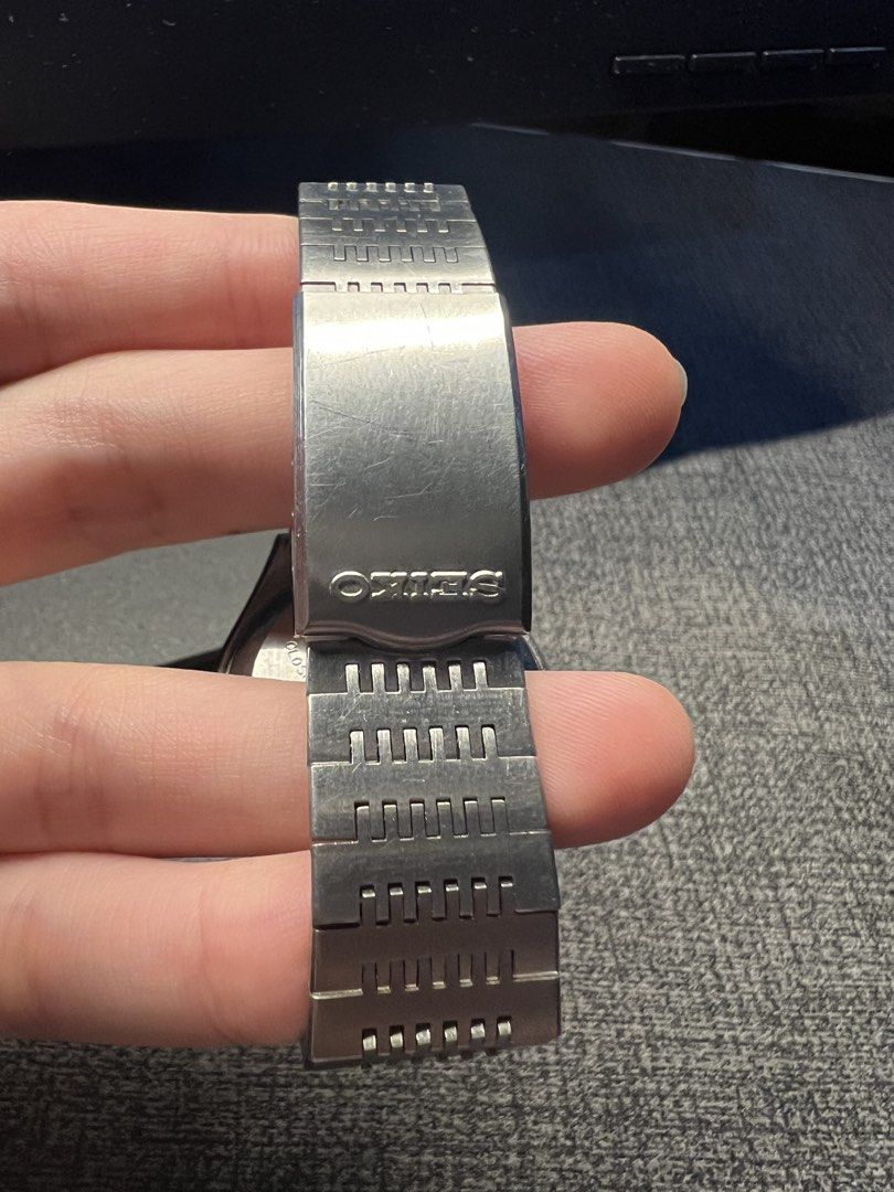 Seiko Quartz Type II Day Date Watch (Category: Men's Watches) located in Manila. Submitted by rvss99 (Listing ID 1454069876, Image 2). Description: - Vintage Seiko Quartz Type II Watch - Classic Silver Dial - Day and Date Complication Japanese & English - Durable Stainless Steel Case - Stainless Steel Bracelet (Note: Has visible scratches) - Watch is in running condition - Excellent addition for watch collectors - Minor hairline marks on the crys