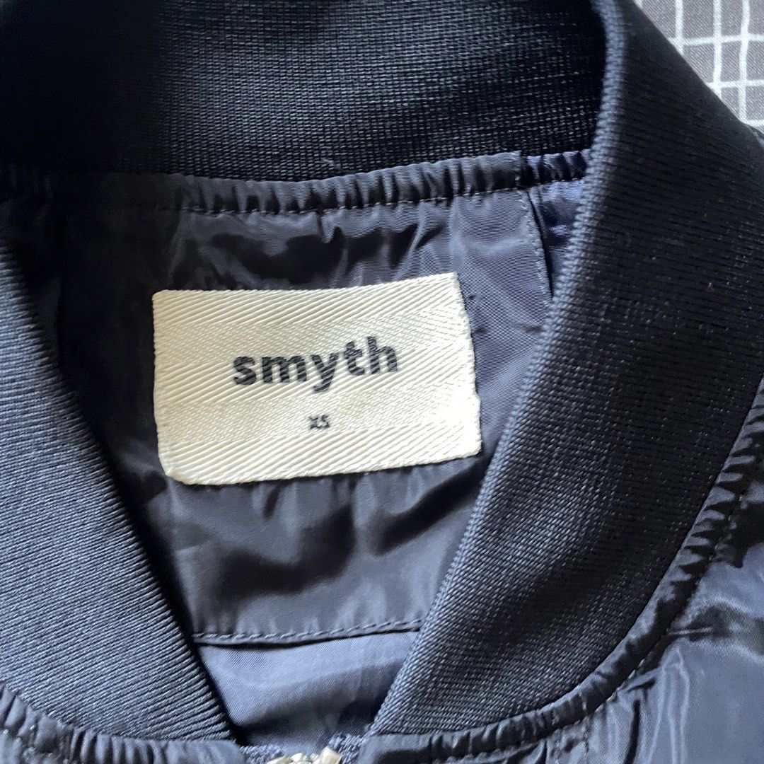 Smyth Bomber Jacket XS- M Navy Blue (Category: Coats, Jackets and Outerwear) located in Mandaluyong City. Submitted by elmo_7 (Listing ID 1454036946, Image 3). Description: - Navy blue Smyth bomber jacket - Size XS but could fit to M - Zip-up front closure - Elasticated cuffs and hem - Two front pockets - Lightweight material - Ideal for layering.
