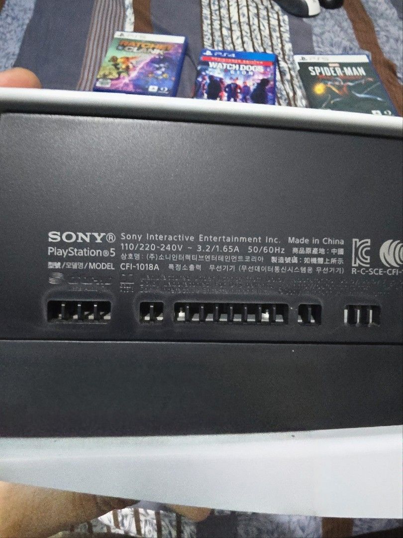 Sony PlayStation 5 Console with Games and Controller (Category: PlayStation) located in Caloocan City. Submitted by kirbylat14148 (Listing ID 1454083291, Image 2). Description: - Sony PlayStation 5 Console (Model CFI-1018A) - Includes 1 Controller - Comes with 6 Games: - Marvel's Spider-Man Miles Morales - Watch Dogs: Legion - NBA 2K22 - Ratchet And Clank - Just Dance 2022 - Death Stranding - Ready for its new owner! Rfs: Back to Pc Gaming Last P