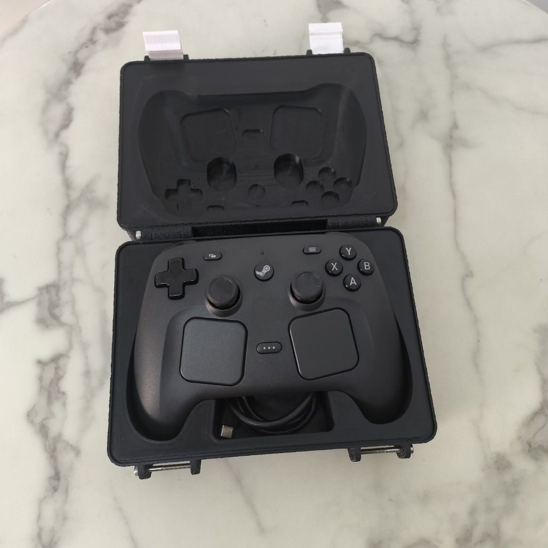 Steam controller 2 casing -without the controller (Category: Controllers) located in Kuala Lumpur. Submitted by b3donline (Listing ID 1454083076, Image 1). Description: Steam controller 2 is so expensive . why not protect it ? - Textured black controller case - Two secure silver clasps on top - Small, sturdy case design - Ideal for storage and travelling your lovely steam controller - Clean and simple aesthetic order to make . 2 working day to po