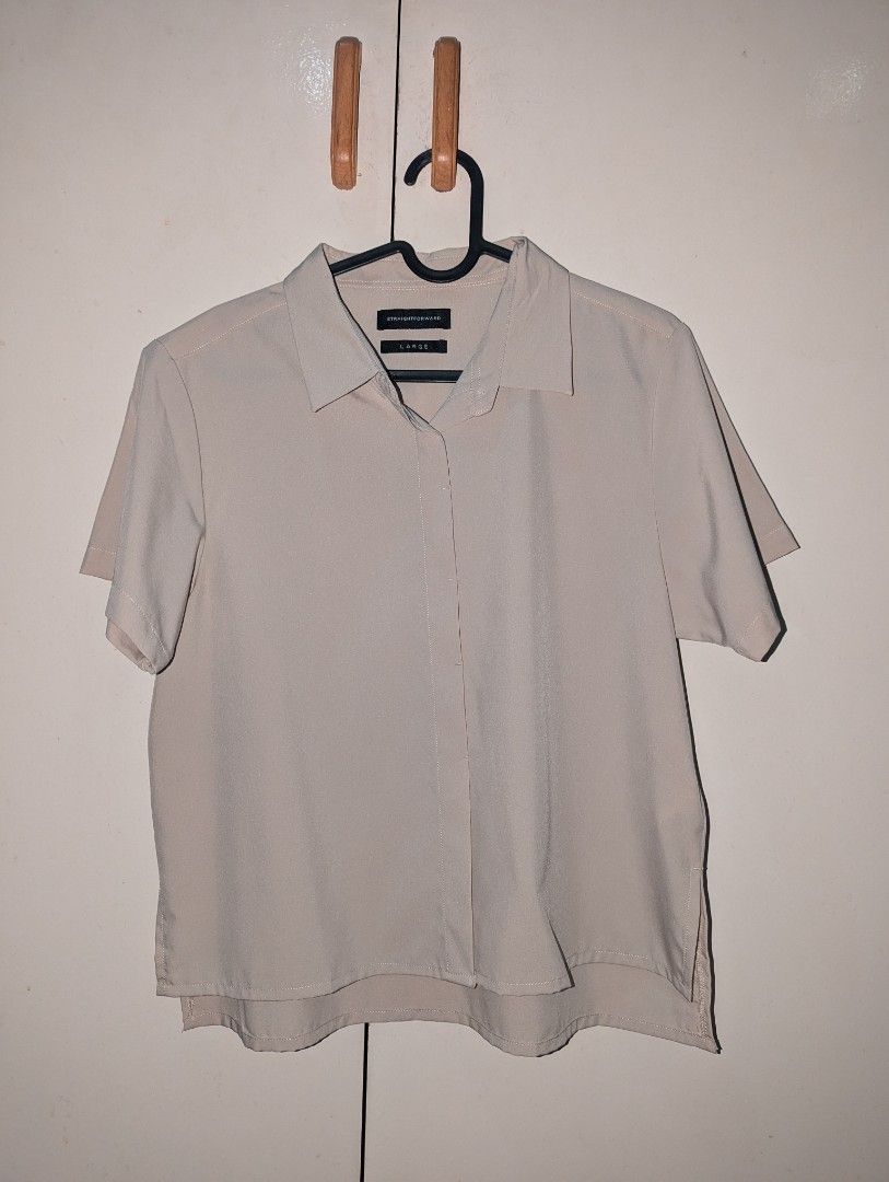 Straightforward Beige Short Sleeve Shirt - Size L (Category: Tshirts & Polo Shirts ) located in Manila. Submitted by booksandbeyond (Listing ID 1454018055, Image 1). Description: - Beige short sleeve shirt from Straightforward - Size: Large - Simple and classic design - Fits M-L - Versatile for casual or work attire - Features a stylish split hem detail on the sides - Effortless to pair with various outfits.