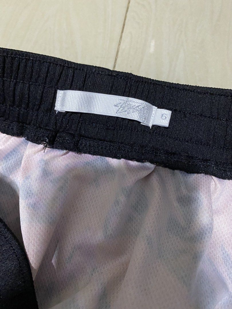 Stussy All Over Print Shorts (Category: Shorts) located in Manila. Submitted by callejage69430 (Listing ID 1454043460, Image 3). Description: 32-34 waistline 21 Lenght - Vibrant Stussy all-over print shorts - Adjustable drawstring waist for a comfortable fit - Made from durable polyester fabric - Ideal for casual outings or athletic activities - Features signature Stussy logo detail.