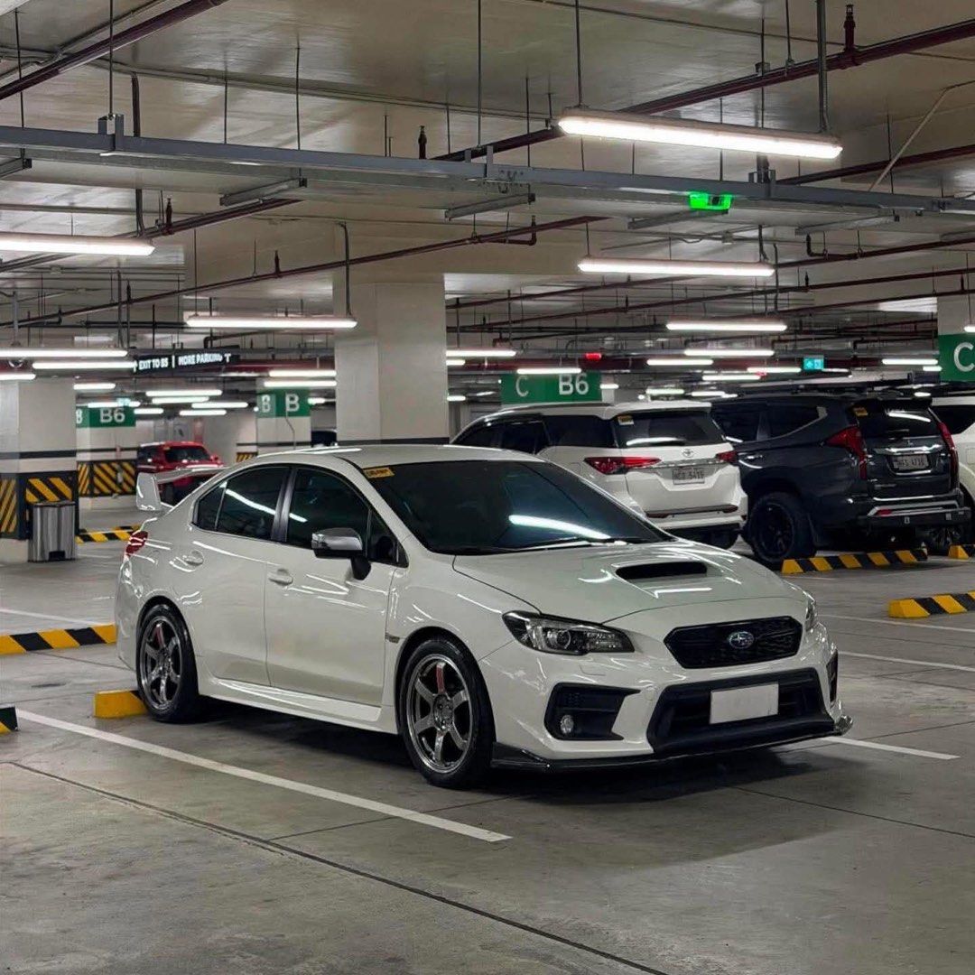 Subaru WRX Eyesight Auto (Category: Used Cars) located in Manila. Submitted by quality_cars (Listing ID 1454175569, Image 2). Description: ‼️FOR SALE‼️ ‼️CASH - TRADE - FINANCING‼️ Subaru WRX Eyesight 2019 model 28,xxx mileage Automatic Transmission Upgrades 👇🏻👇🏻 Rays TE37 Saga Rays Center Cap Michelin Pilot Sport STI Cabon Fiber Chin STI Wing STI Emblem 2 Keys Casa Maintained Complete Manual Booklet Complete Papers P1,218,000 negotiable View