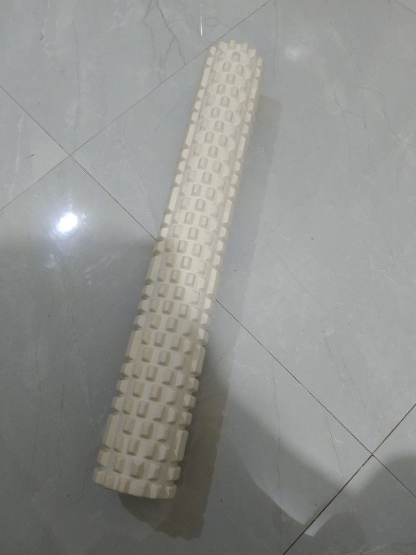 Textured Foam Roller for Muscle Massage (Category: Massage Devices) located in Valenzuela. Submitted by misssfashionn (Listing ID 1454137558, Image 1). Description: - Textured surface for deep tissue massage - Ideal for post-workout recovery - Relieves muscle tension and soreness - Improves flexibility - Compact and portable for easy storage and travel - Great for home use It has a textured surface with raised blocks and ridges, which is designed