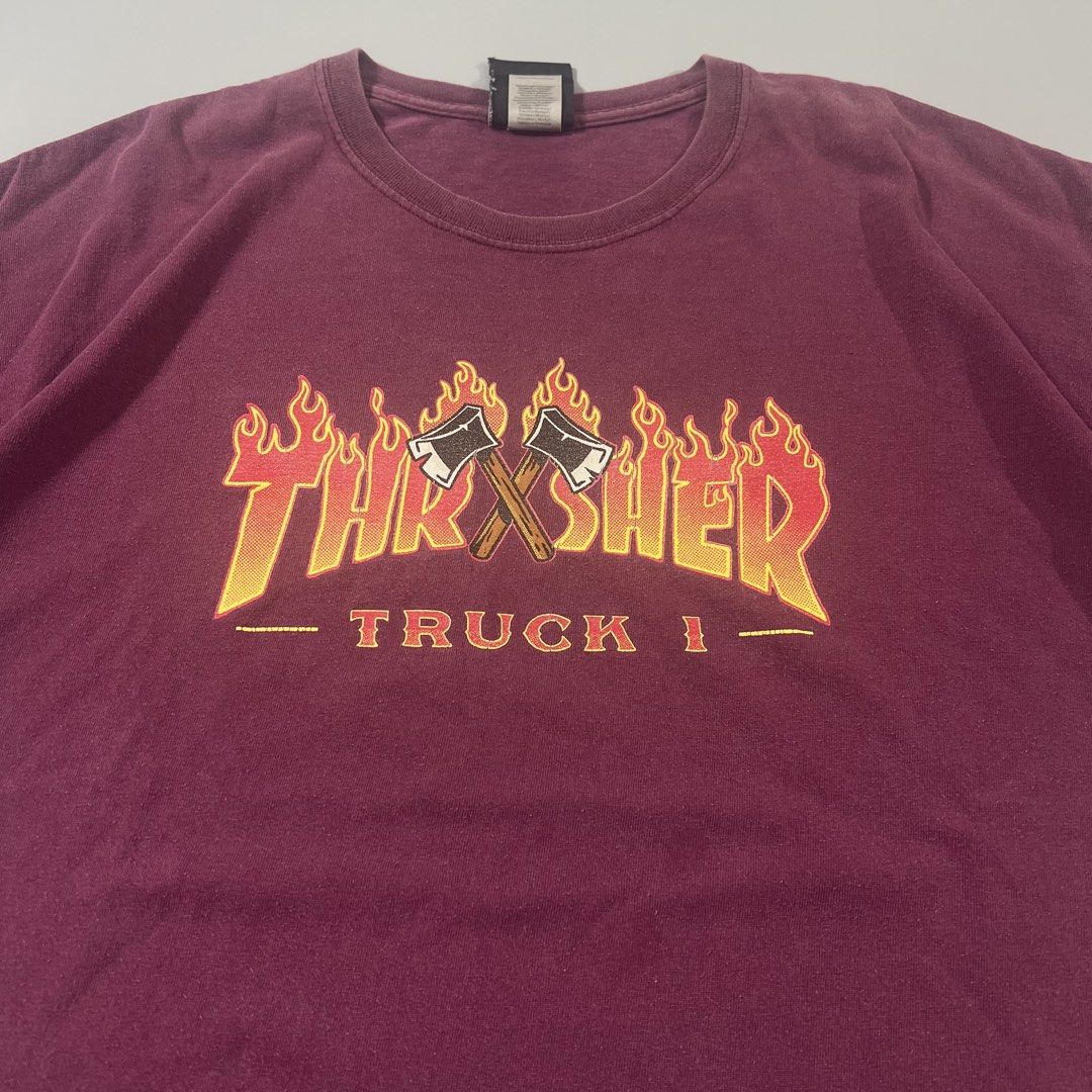 Thrasher Flame Tee (Category: Tshirts & Polo Shirts ) located in Baguio. Submitted by pinkpixie (Listing ID 1454153615, Image 3). Description: - Burgundy Thrasher t-shirt - Classic flame logo with "Truck 1" text - Size: XL (check tag) - Material: 100% Cotton - Ideal for skater and streetwear enthusiasts.