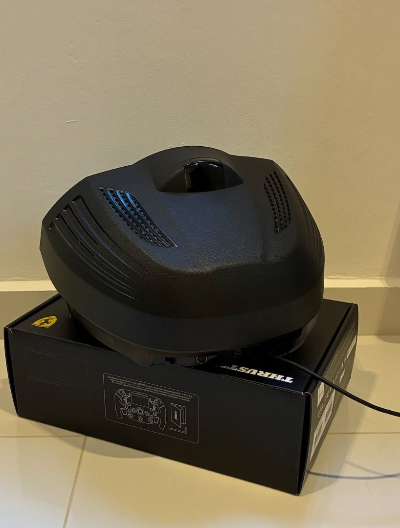 Thrustmaster TX Servo Base (Category: Controllers) located in Singapore. Submitted by fastdolphin-7f4c (Listing ID 1454044781, Image 3). Description: - Thrustmaster TX Servo Base - Comes with clamp and wires - Official Thrustmaster product - Price negotiable - can buy complete bundle with Thrustmaster SF1000 Wheel Add-on and Thrustmaster T-LCM Load Cell Pedals for S$750.