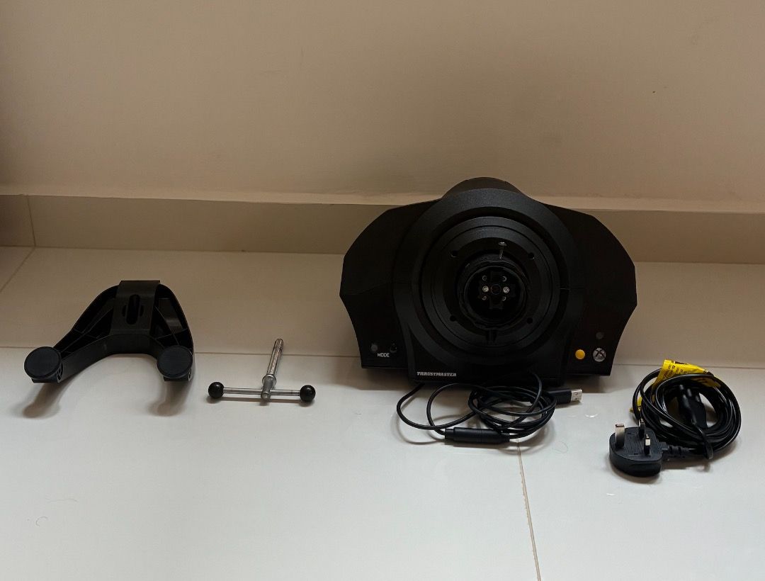 Thrustmaster TX Servo Base (Category: Controllers) located in Singapore. Submitted by fastdolphin-7f4c (Listing ID 1454044781, Image 1). Description: - Thrustmaster TX Servo Base - Comes with clamp and wires - Official Thrustmaster product - Price negotiable - can buy complete bundle with Thrustmaster SF1000 Wheel Add-on and Thrustmaster T-LCM Load Cell Pedals for S$750.