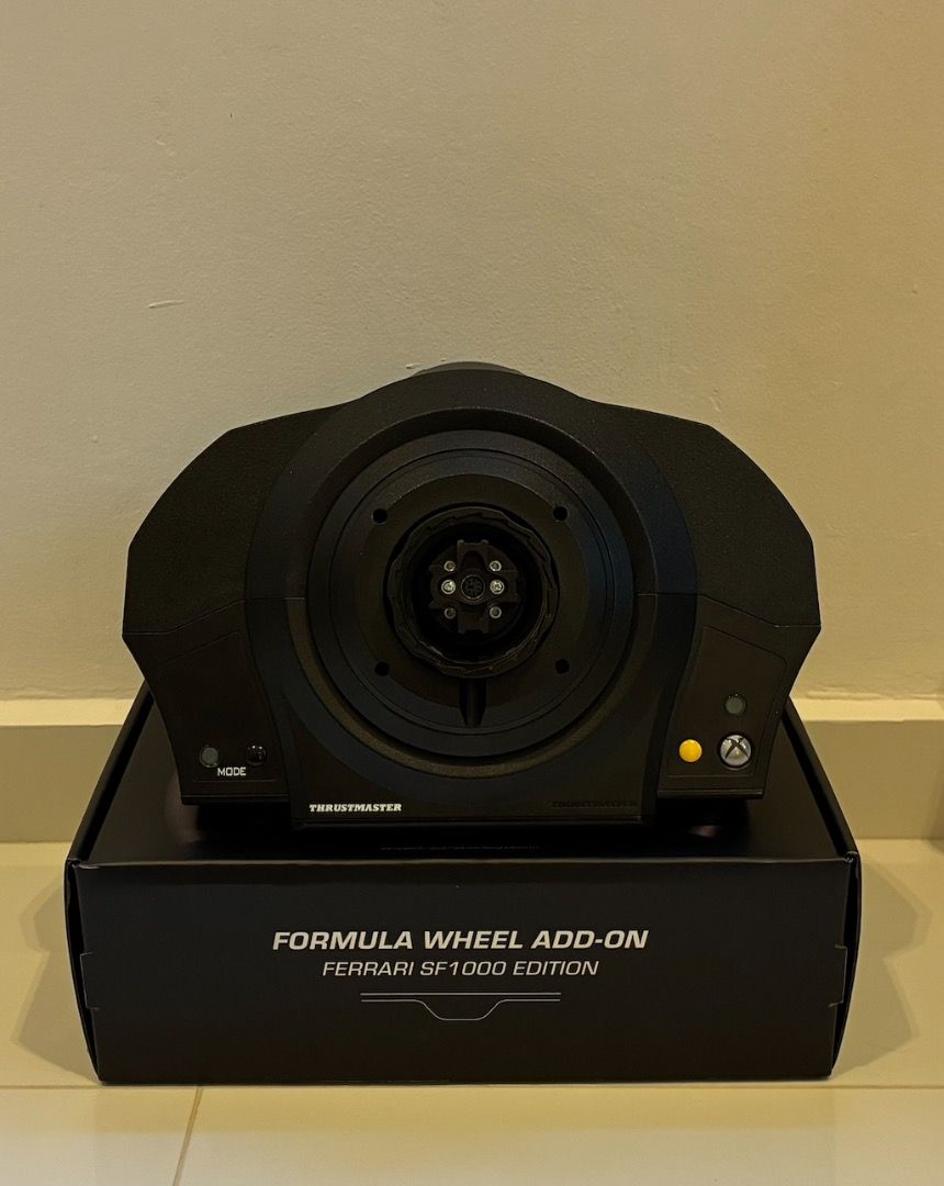 Thrustmaster TX Servo Base (Category: Controllers) located in Singapore. Submitted by fastdolphin-7f4c (Listing ID 1454044781, Image 2). Description: - Thrustmaster TX Servo Base - Comes with clamp and wires - Official Thrustmaster product - Price negotiable - can buy complete bundle with Thrustmaster SF1000 Wheel Add-on and Thrustmaster T-LCM Load Cell Pedals for S$750.