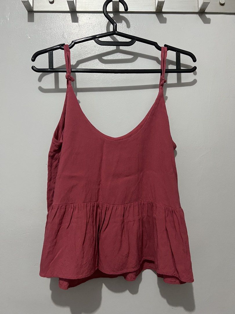 Topshop Pink Peplum Cami Top (Category: Sleeveless) located in Manila. Submitted by justppatterns (Listing ID 1454133038, Image 1). Description: - Size: EUR 34, US 2, UK 6 (fits S-L) - Pink cami top from Topshop - Features a peplum hem - Adjustable tie straps - Lightweight fabric, ideal for warm weather - Versatile for dressing up or down .