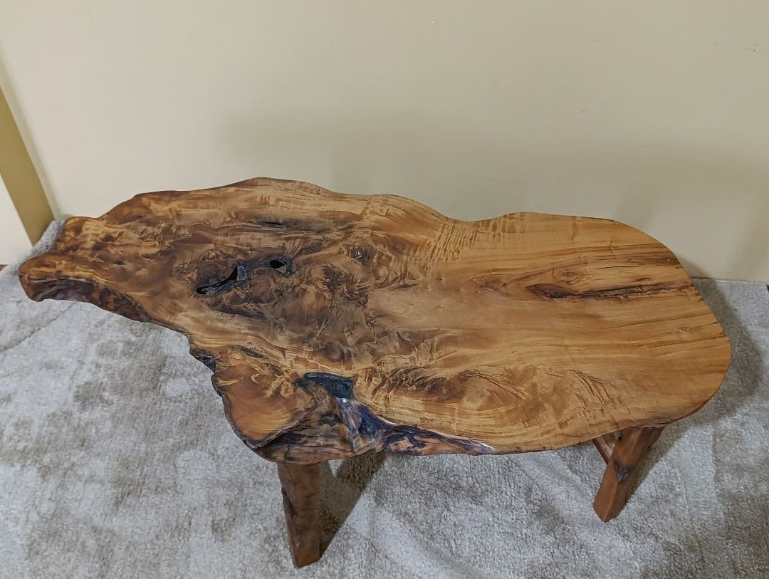 Unique Live Edge Wood Coffee Table with Natural Root Base (Category: Tables & Sets) located in Manila. Submitted by youngflower_9e0e16 (Listing ID 1454151832, Image 3). Description: - One-of-a-kind coffee table - Features a beautiful live edge wood top with natural grain patterns - Base made from intertwined natural roots for a rustic and artistic look - A guaranteed conversation starter for your living space - Measures approximately [insert dime