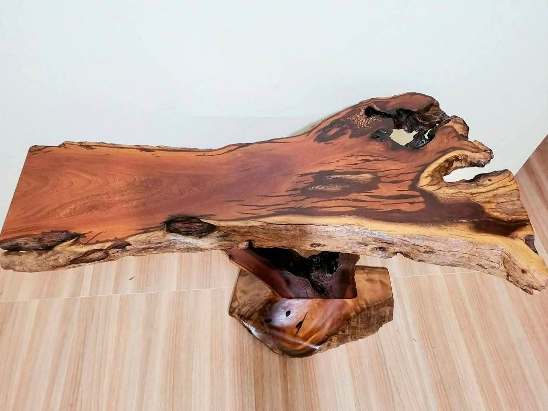 Unique Live Edge Wood Console Table with Natural Wood Base (Category: Tables & Sets) located in Manila. Submitted by youngflower_9e0e16 (Listing ID 1454152151, Image 3). Description: - One-of-a-kind console table - Features a live edge wood slab top - Base crafted from a natural wood trunk and solid wood piece - Beautiful, rich wood grain - Rustic and organic aesthetic - Ideal statement piece for entryway or living room - Approximate dimensions: 