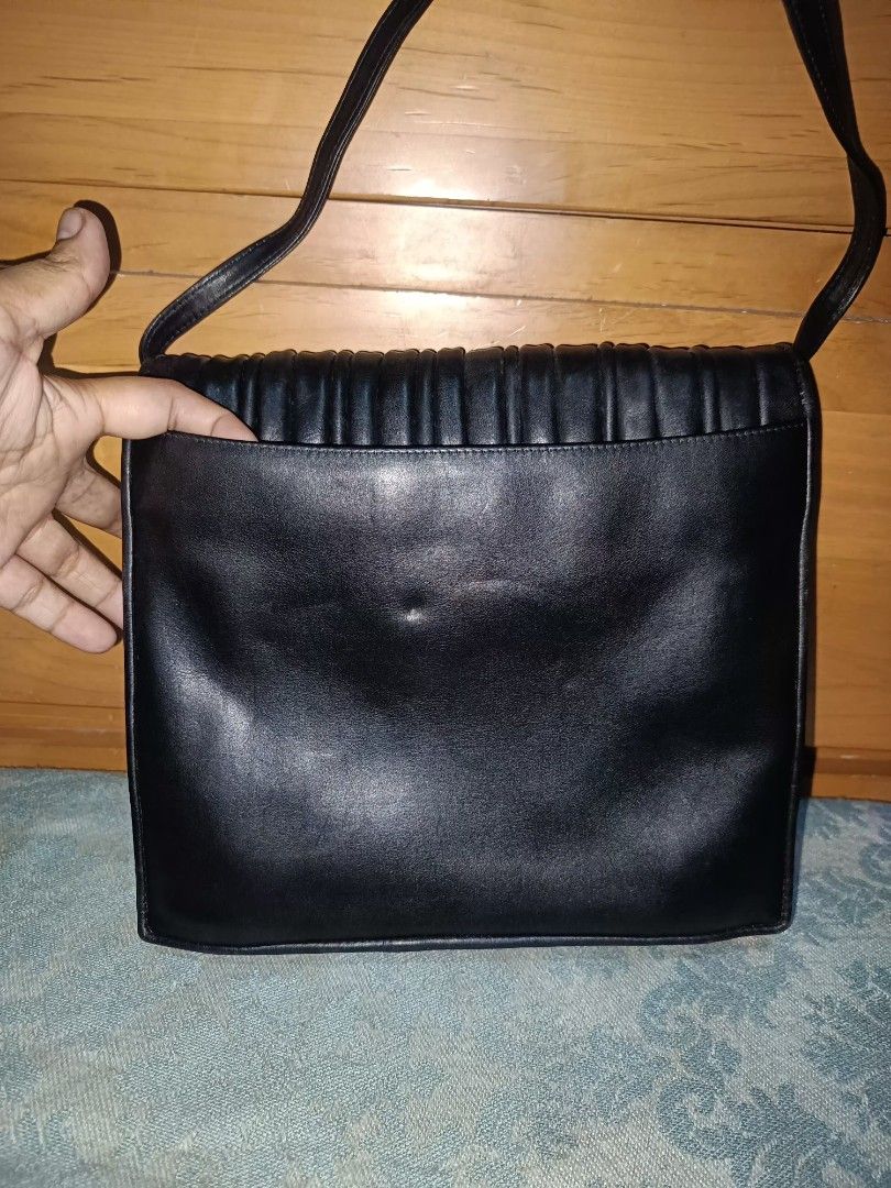 Valentino Garavani Sling Bag (Category: Luxury Bags & Wallets) located in Baguio. Submitted by roselleshiddentreasures13384 (Listing ID 1454186728, Image 3). Description: 🌸Genuine Leather Material 🌸No Major Issue 🌸Normal Signs Of Use Only 📏Meduim Size 🖼️Check All Photos For Other Details 🌸Limit Your Expectation The Item Is Preloved From Ukay ❌No Return No Exchange. ❗.
