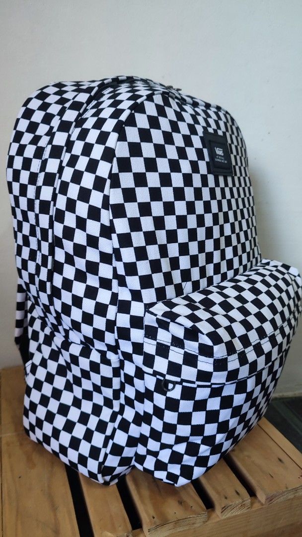 Vans Checkerboard Backpack (Category: Backpacks) located in Manila. Submitted by janyvony_315 (Listing ID 1454009511, Image 1). Description: - Classic Vans checkerboard design (black & white) - Front zip pocket for essentials - Spacious main compartment - Adjustable shoulder straps for comfort - Brand new with tags still attached - Ideal for school, work, or everyday use.