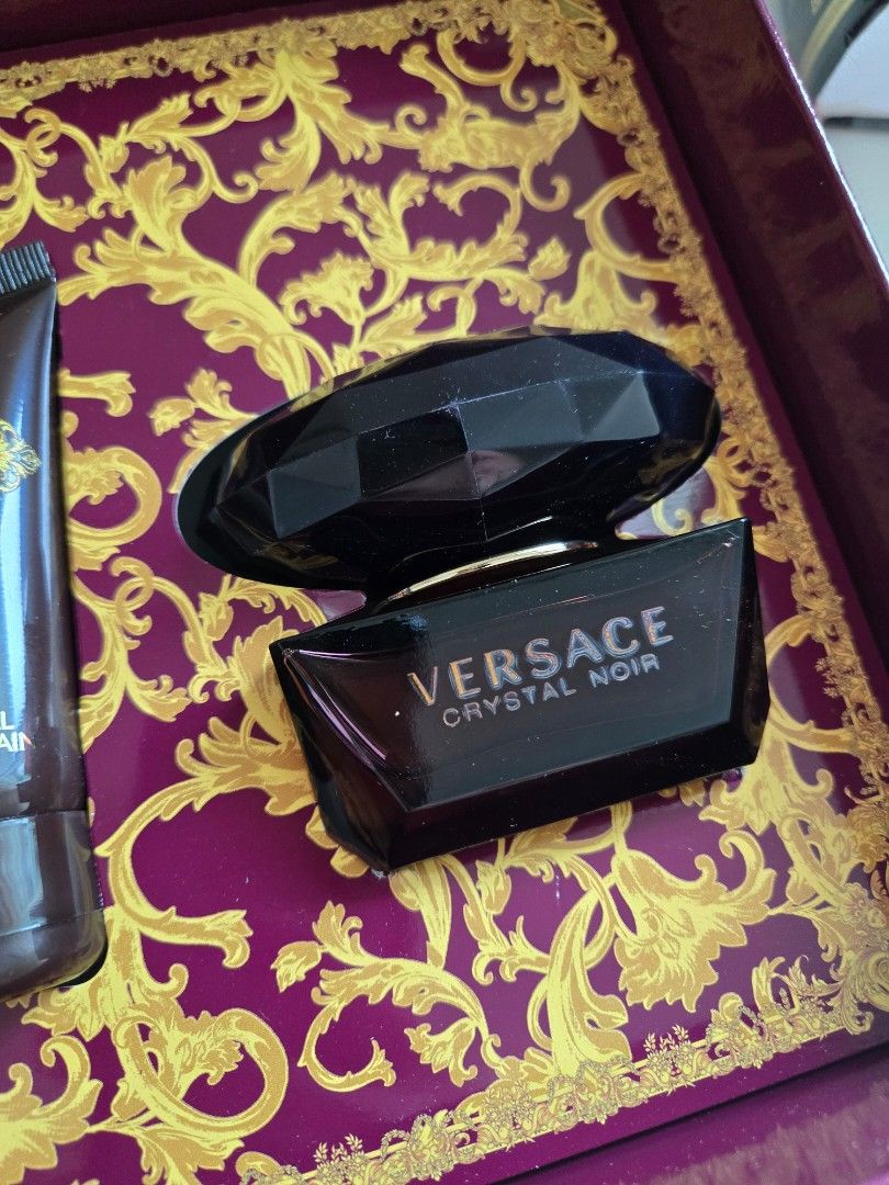Versace Crystal Noir EDT Gift Set (Category: Fragrance & Deodorants) located in Quezon City. Submitted by samcas (Listing ID 1454032202, Image 3). Description: Authentic Versace Crystal Noir gift set. Includes 50ml Eau de Toilette, body lotion, and shower gel. Comes in a decorative box, perfect for gifts..