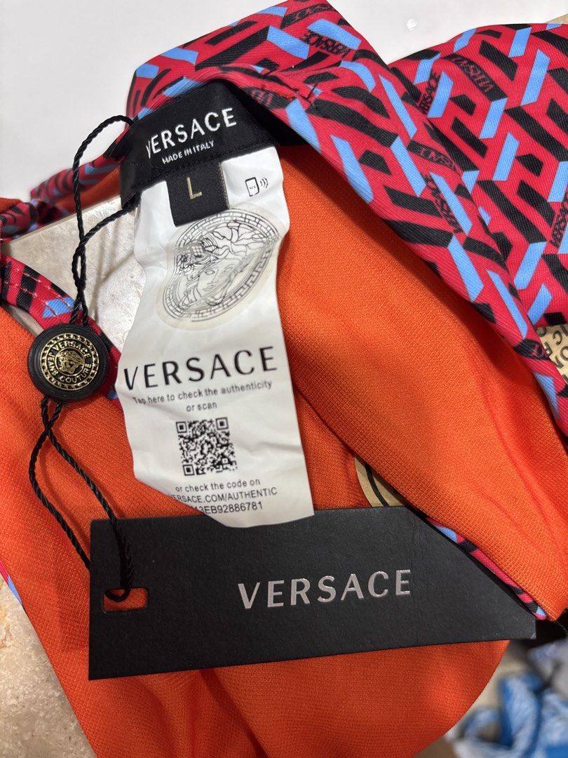 Versace Medusa Print Bikini Set (Category: Bikinis & Swimsuits) located in Paranaque City. Submitted by jujudeclutterss (Listing ID 1454104760, Image 3). Description: - Authentic Versace bikini set - Features the Medusa Amplified print (red, blue, black) - Size: L - Made in Italy - Brand new with tags attached - Verified authentic via Versace's website.