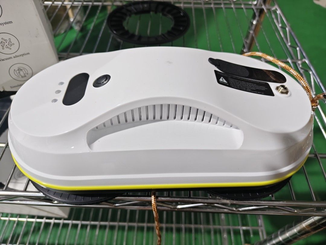 Window cleaning robot (Category: Vacuum Cleaner & Housekeeping) located in Singapore. Submitted by ah.ye (Listing ID 1454122621, Image 2). Description: SellingthisawesomeWindowCleaningRobot,perfectforkeepingyourhomesparklingcleanwithminimaleffort!It'sdesignedwithsmartdrivetechnologyandadetectionsystemtonavigateyourwindowsefficiently.Thevacuumadsorptionensuresitstayssecurelyattachedwhileitworksitsmagic,simulatingmanualwipingforastreak-freefinish.T