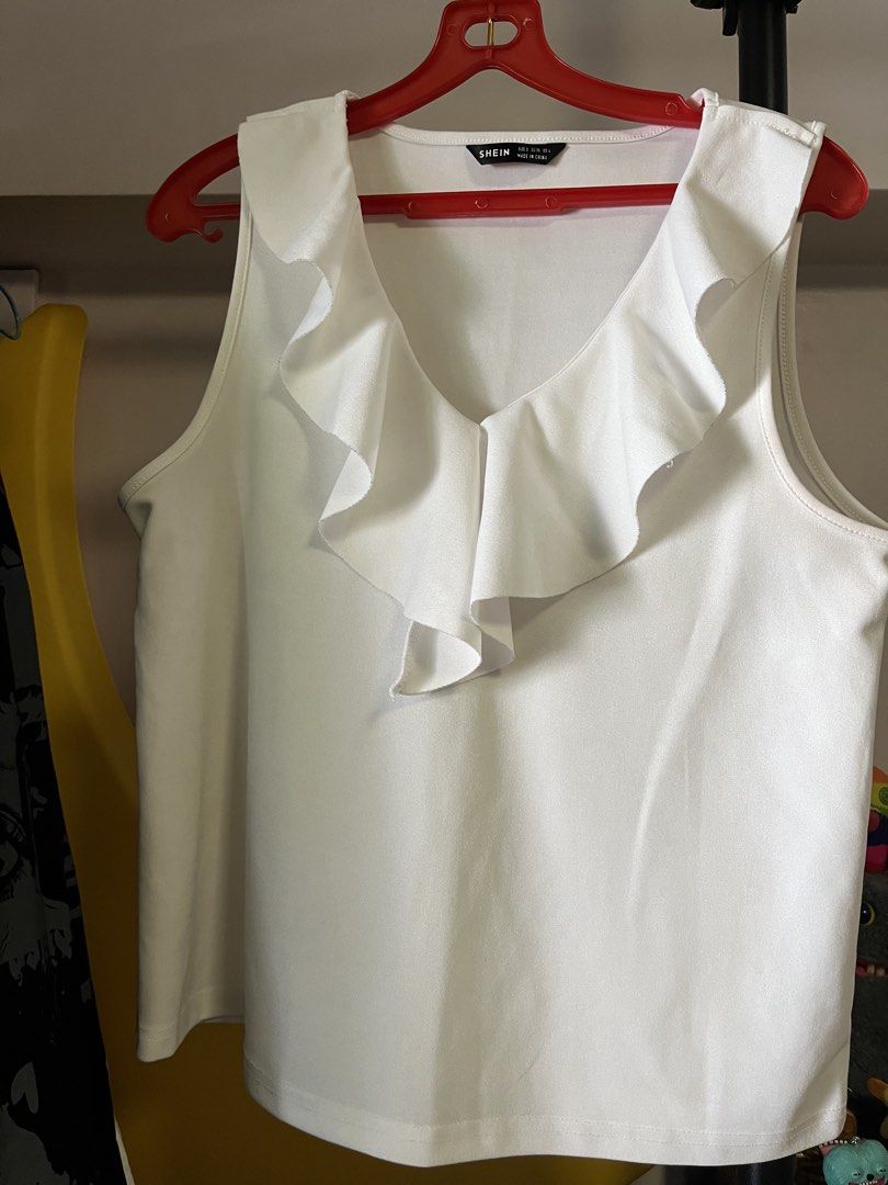 work blouse (Category: Sleeveless) located in Singapore. Submitted by mailingpreferredpls (Listing ID 1454069009, Image 2). Description: barely worn selling cheap to clear.
