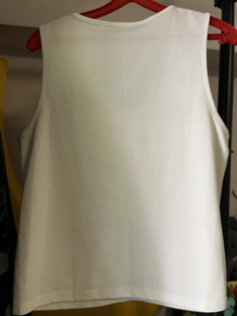 work blouse (Category: Sleeveless) located in Singapore. Submitted by mailingpreferredpls (Listing ID 1454069009, Image 3). Description: barely worn selling cheap to clear.