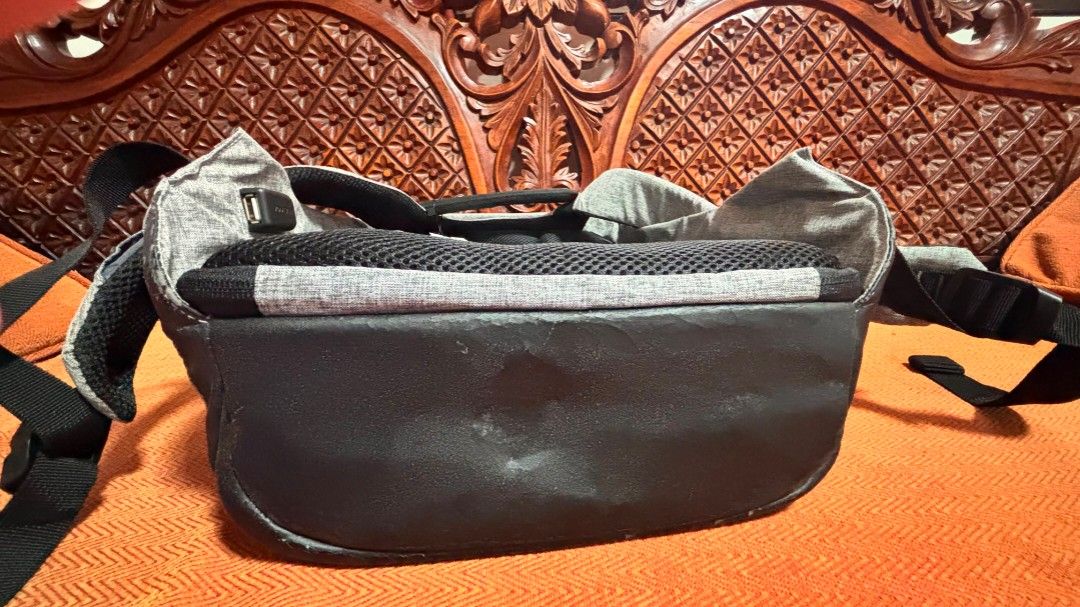 XD Design Anti-Theft Backpack (Category: Laptop Bags & Sleeves) located in Marikina City. Submitted by cutestfinds (Listing ID 1454048187, Image 3). Description: Please note that although this has never been used, there are noticeable cracks on the leather (front part of the backpack) since it has been stored for a long time. It also has a pin attached to one strap of the bag, but it can be removed. Once removed, you will see two cuts where the p