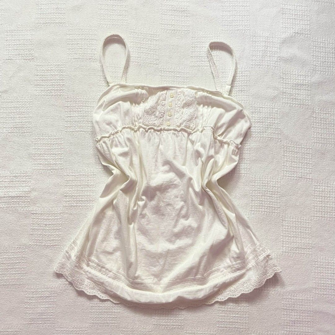 2000s white lace babydoll top (Category: Sleeveless) located in Rizal. Submitted by urkoala (Listing ID 1454269552, Image 1). Description: - fits small - adjustable straps.