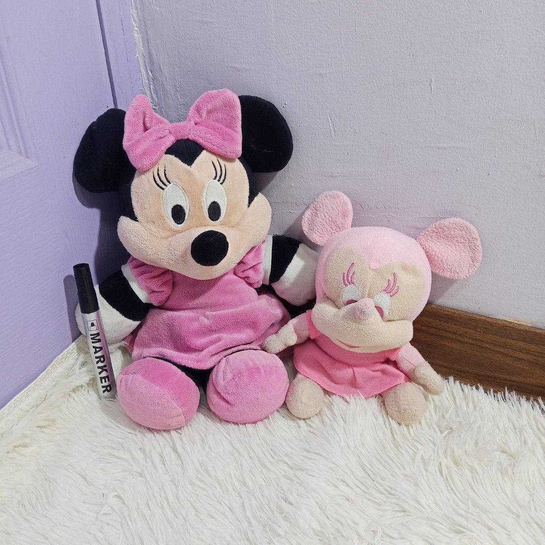 2 Pink Minnie Mouse Plush Toys (Category: Plushies & Soft Toys) located in Rizal. Submitted by wishaul (Listing ID 1454238409, Image 1). Description: - Set of two adorable pink Minnie Mouse plush toys. - Larger Minnie features a pink dress and matching bow. - Smaller Minnie is also in a sweet pink color. - Both plushies are incredibly soft and cuddly. - Ideal for any Minnie Mouse enthusiast. - Makes a wonderful addition to a child's room. - Perfe