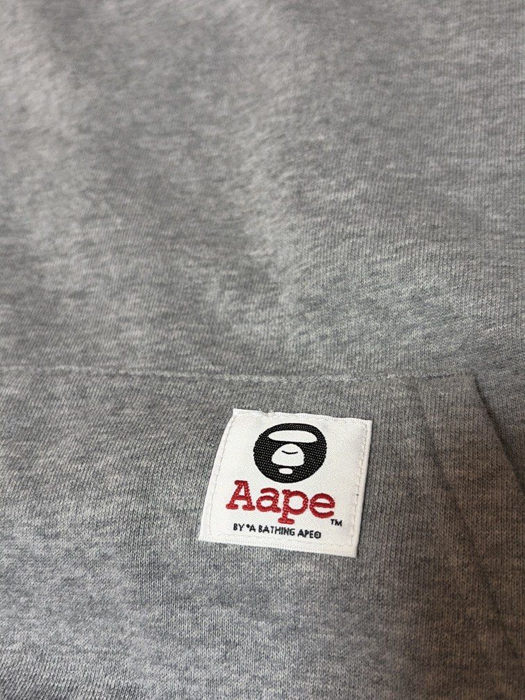 Aape Small Logo Hoodie (Category: Coats, Jackets and Outerwear) located in Quezon City. Submitted by morespace555 (Listing ID 1454273361, Image 2). Description: Personally bought this from Aape HK store 3 years ago Lost the hoodie string already Size medium mens but it shrank a little.