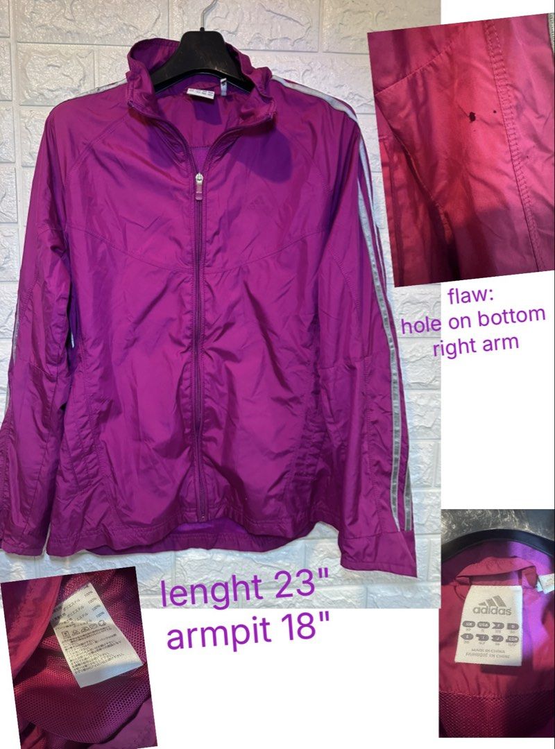 Adidas Purple Track Jacket with 3 Stripes (Category: Coats, Jackets and Outerwear) located in San Juan City. Submitted by vrgyl (Listing ID 1454222083, Image 1). Description: - Classic purple Adidas track jacket - Features iconic 3 stripes on sleeves - Measurements: 23 inches (length), 18 inches (armpit to armpit) - Condition: Small hole on the bottom of the right arm - Material: 100% Polyester - Ideal for workouts or casual wear.