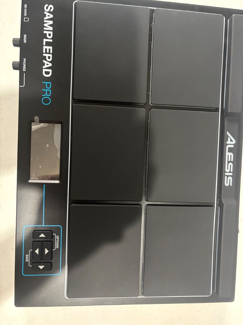Alesis Sample Pad Pro (Category: Musical Instruments) located in Pasig City. Submitted by chingketeesph (Listing ID 1454206183, Image 3). Description: - Alesis SamplePad Pro with 8 velocity-sensitive pads. - Includes: Power adapter, extra screws for stand mount -No SD card included -Default drum presets are loaded Condition: Good as new, the drum pad is smooth without scratches Freebies: 1. Bass drum kick pedal 2. Pair of Onix drumsticks 3. Extra
