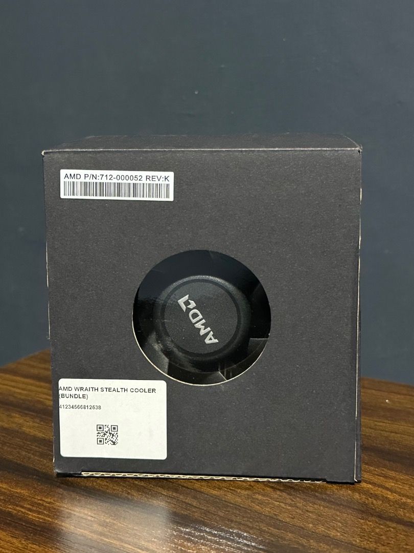 AMD Wraith Stealth Cooler CPU Fan (Category: Computer Parts) located in Dasmarinas. Submitted by popmartz (Listing ID 1454283888, Image 3). Description: Selling a brand new, unused AMD Wraith Stealth CPU Cooler. This is the official stock cooling solution bundled with select AMD Ryzen processors. It features a compact, low-profile design ideal for standard PC builds, offering reliable cooling performance and quiet operation for everyday tasks and