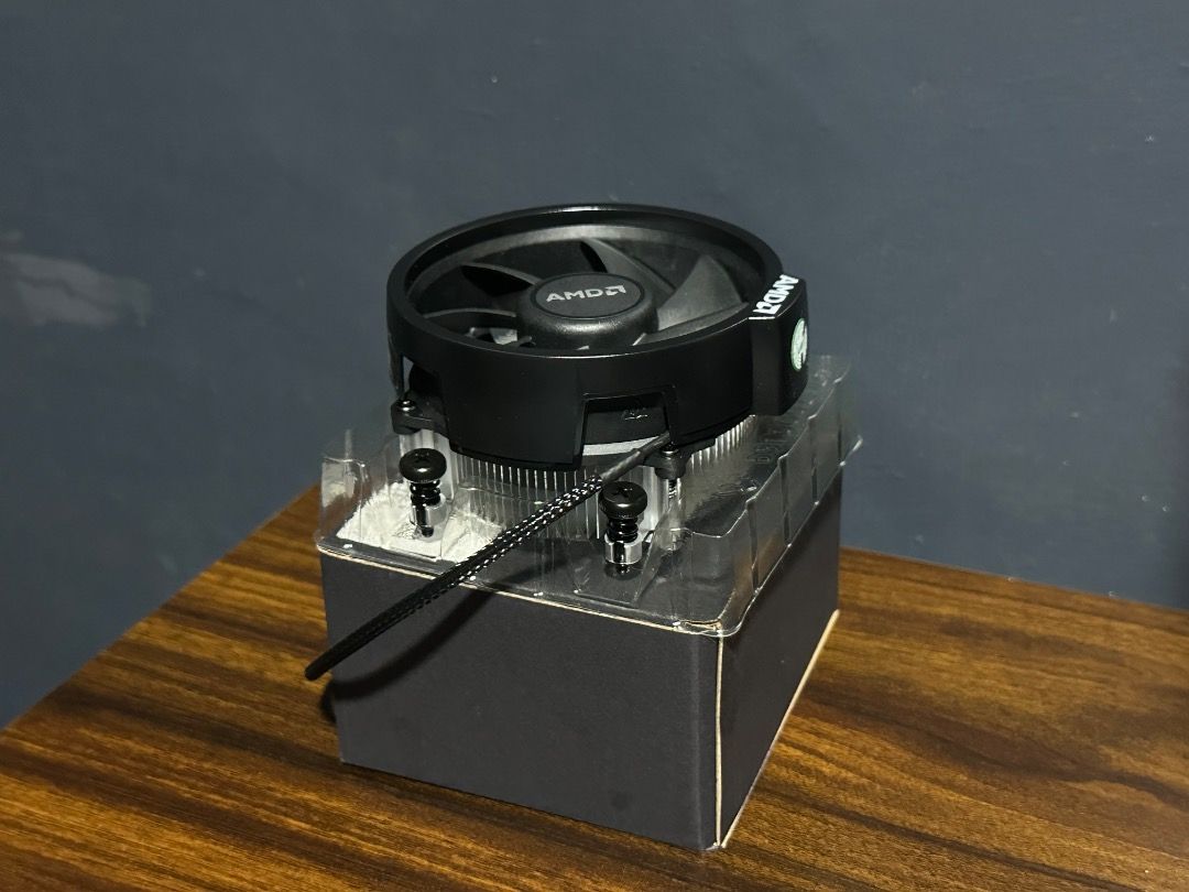 AMD Wraith Stealth Cooler CPU Fan (Category: Computer Parts) located in Dasmarinas. Submitted by popmartz (Listing ID 1454283888, Image 1). Description: Selling a brand new, unused AMD Wraith Stealth CPU Cooler. This is the official stock cooling solution bundled with select AMD Ryzen processors. It features a compact, low-profile design ideal for standard PC builds, offering reliable cooling performance and quiet operation for everyday tasks and