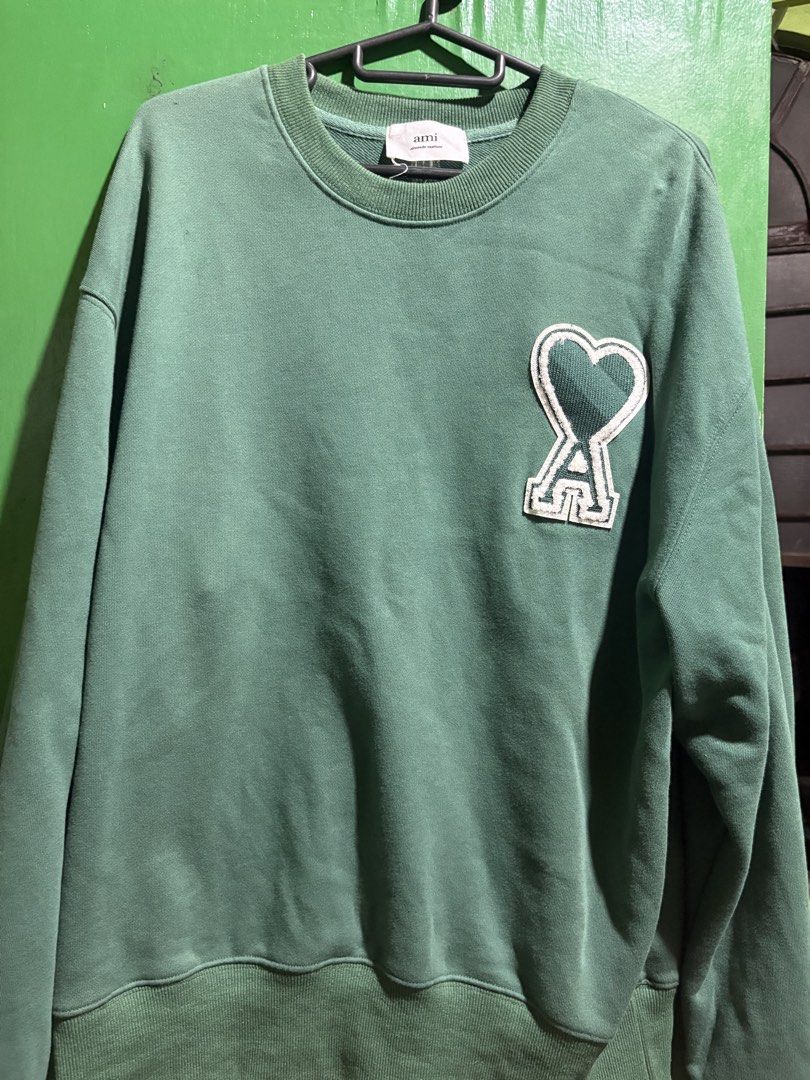 AMI Crewneck (Category: Luxury Apparel) located in Manila. Submitted by jacebased (Listing ID 1454347301, Image 1). Description: L-XL 9/10 like new DM for more details !.