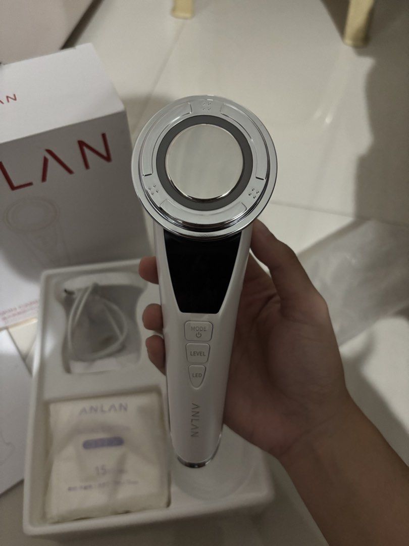 ANLAN Face Massager Pro (Category: Face Care) located in Manila. Submitted by aysshxx (Listing ID 1454349914, Image 3). Description: - ANLAN Skin Care Machine for a radiant glow. - Comes with the device, charging cable, and instruction manual. - All items are in their original packaging..