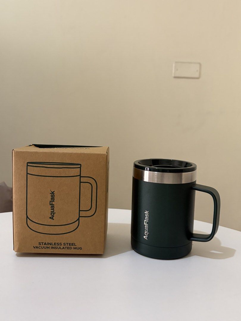 Aquaflask Insulated Mug (Category: Water Bottles & Tumblers) located in Caloocan City. Submitted by katherinep18635 (Listing ID 1454280523, Image 1). Description: - Brand: Aquaflask - Type: Insulated Mug - Color: Moss Green - Material: Stainless Steel - Feature: Vacuum Insulated - Benefit: Keeps beverages hot or cold - Condition: Brand new, comes with original box.