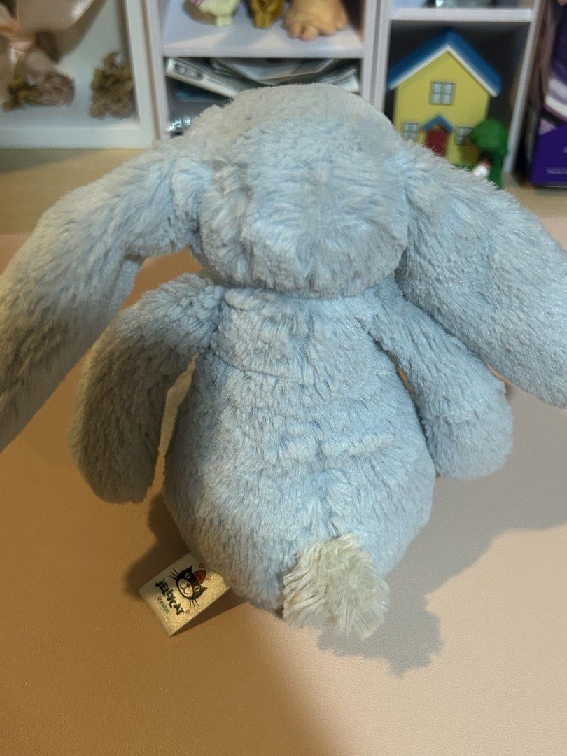 authentic jellycat bashful blue bunny (Category: Plushies & Soft Toys) located in Quezon City. Submitted by eatnat (Listing ID 1454358250, Image 2). Description: - well loved but clean, would prefer if you washed once received - rattle inside still works - tags still attached - for collectors or for infants :) !!.