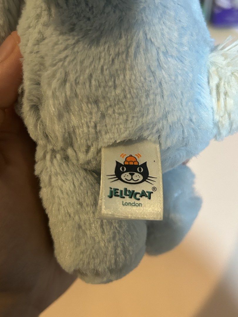 authentic jellycat bashful blue bunny (Category: Plushies & Soft Toys) located in Quezon City. Submitted by eatnat (Listing ID 1454358250, Image 3). Description: - well loved but clean, would prefer if you washed once received - rattle inside still works - tags still attached - for collectors or for infants :) !!.