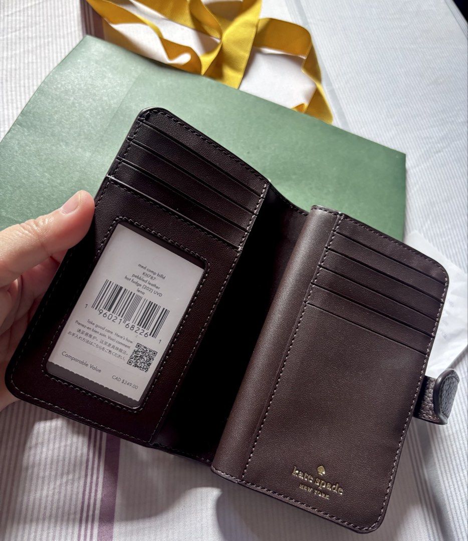 AUTHENTIC & IMPORTED Kate Spade Hot Fudge Medium Wallet (Category: Wallets & Card holders) located in Malolos. Submitted by cheerz21 (Listing ID 1454212144, Image 3). Description: Authentic & Imported Lena Kate Spade Medium Wallet Material: Pebbled Leather Color: Hot Fudge MINT Condition Barely used, good as new w/ paper bag If in doubt don’t buy. No return, no exchange. 📌 Disclaimer: Cheerz21 is not affiliated, associated, or in any way connect