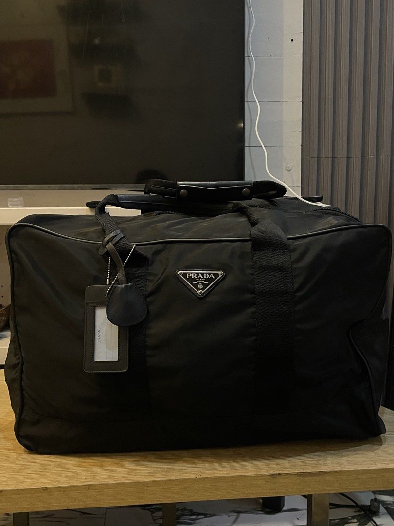 Authentic prada duffle bag big size (Category: Luxury Accessories) located in Cavite. Submitted by ohmie23 (Listing ID 1454188310, Image 1). Description: Authentic prada duffle bag big size.