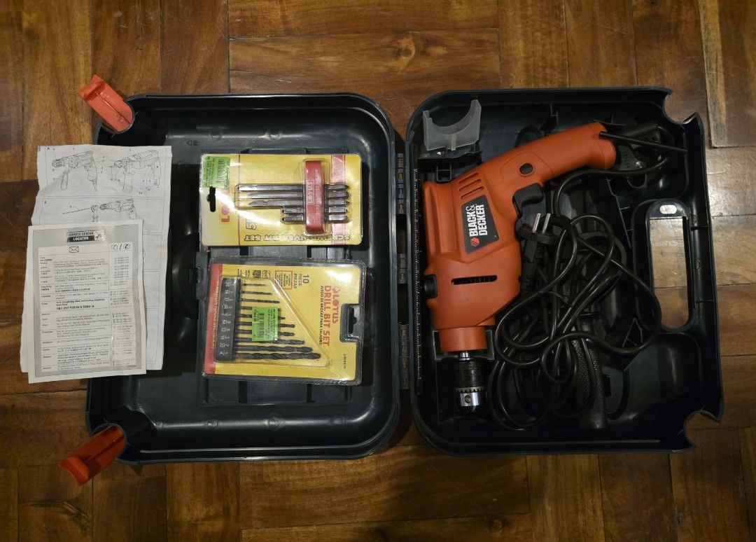 Black & Decker Electric Drill with Drill Bit Set and Case (Category: Construction Tools & Equipment) located in Pasay City. Submitted by rsar888 (Listing ID 1454271142, Image 3). Description: - Black & Decker electric drill - Includes drill bits for wood and metal - Comes with manual - Original carrying case included for easy storage and transport - corded percussion hammer drill featuring a 13mm chuck and variable speeds - Ideal for home DIY pro